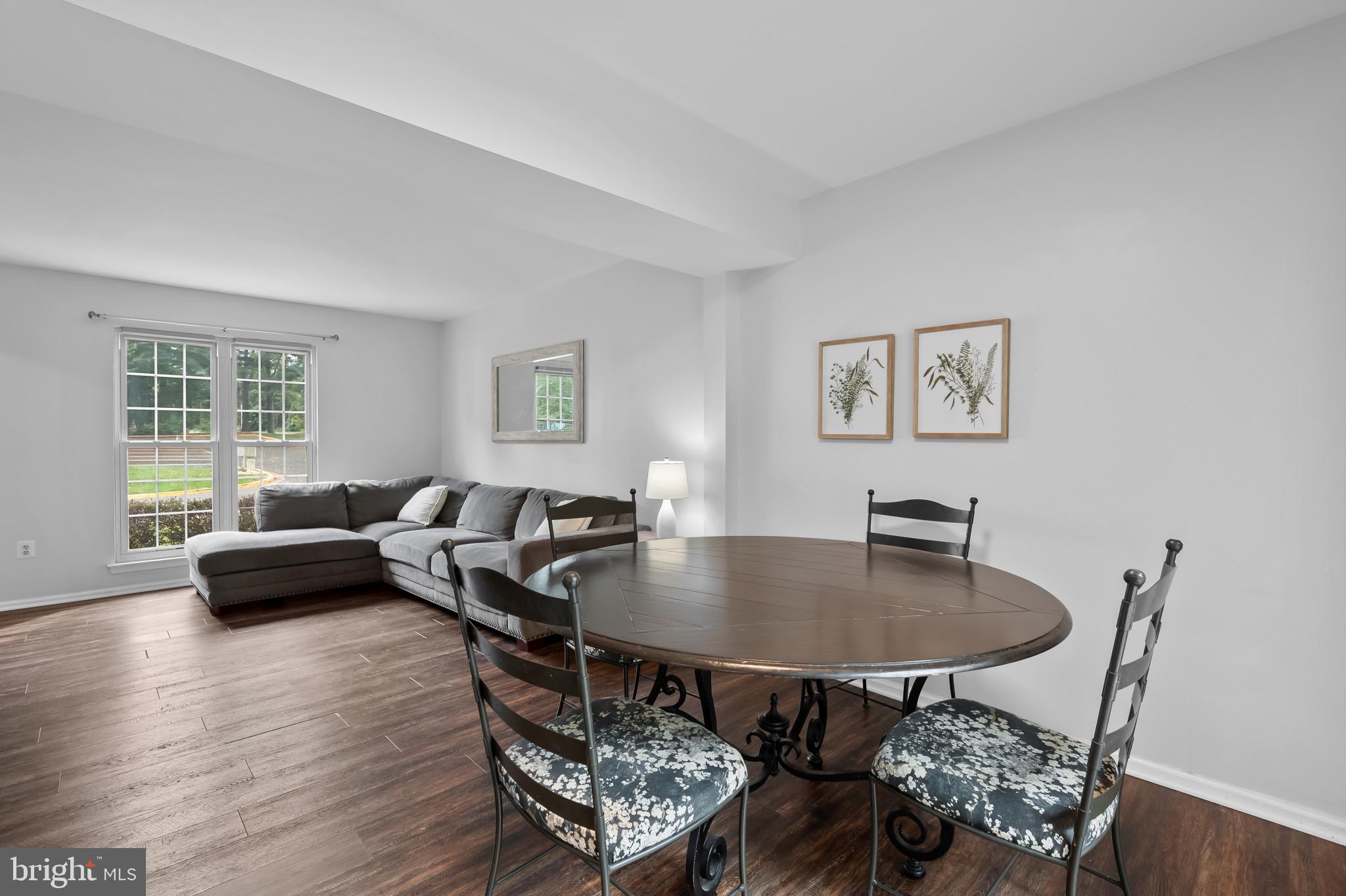 4511 Jenner Court Olney, MD 20832 - Photo 9 of 40 a living room with furniture and a table