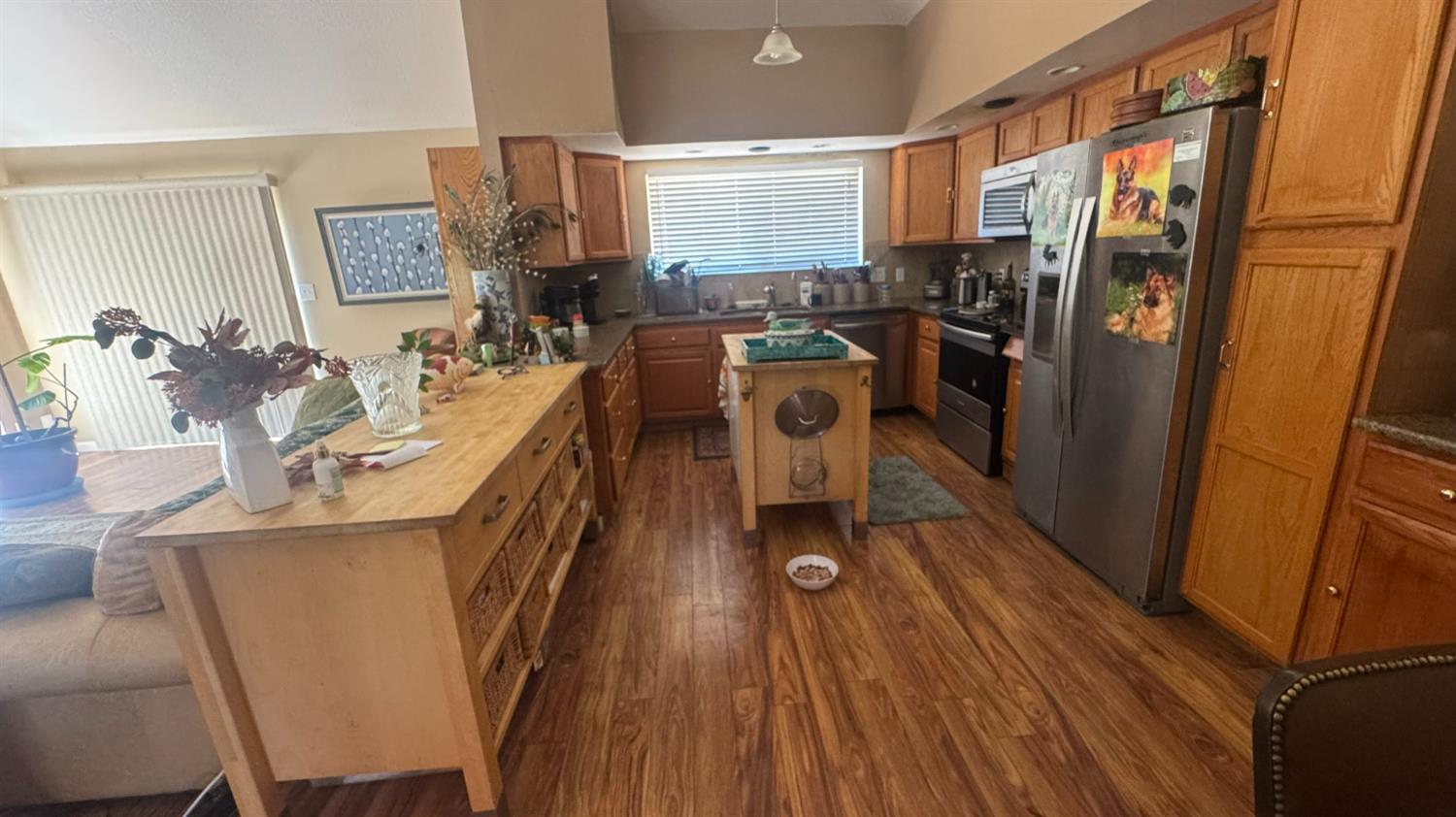 31160 Revis Road Coarsegold, CA 93614 - Photo 8 of 15 a dining room with furniture and wooden floor