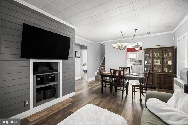 a view of a dining room with furniture