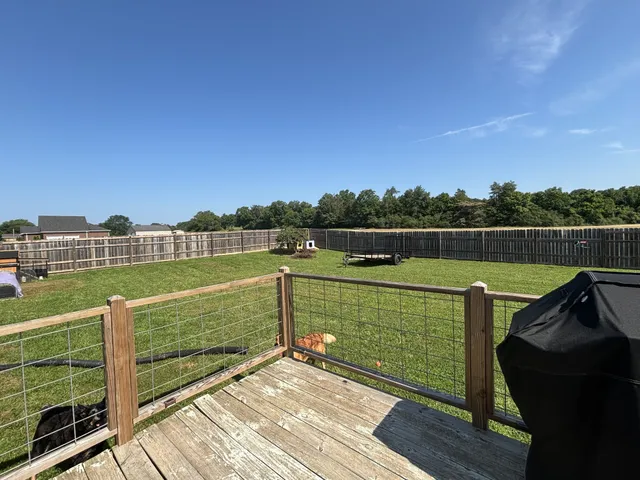 a view of a lake with a deck