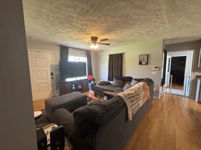 a bed room with a bed and a mirror