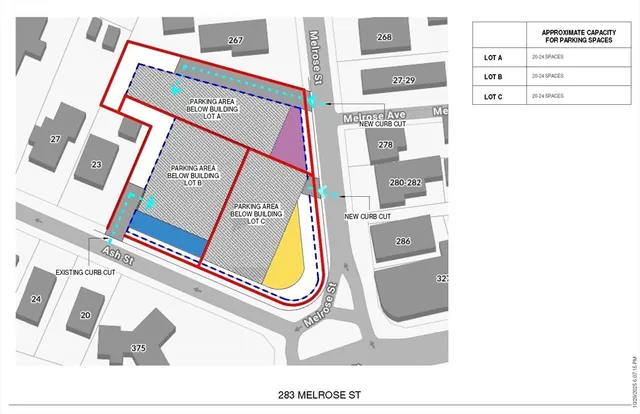 an aerial view of a city with large buildings