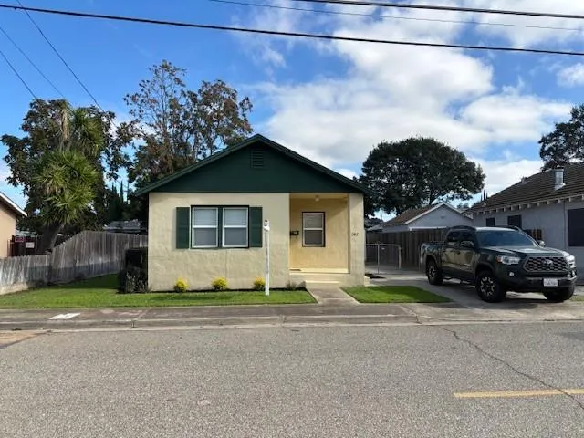 a car parked in front of a house