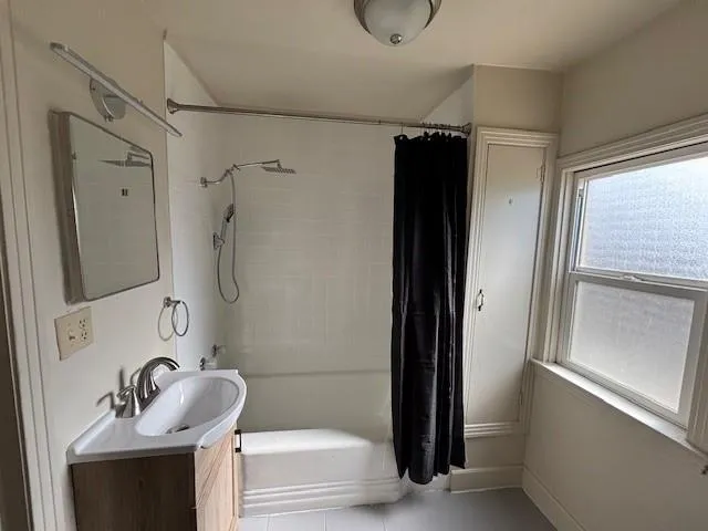 a bathroom with a sink and a bathtub