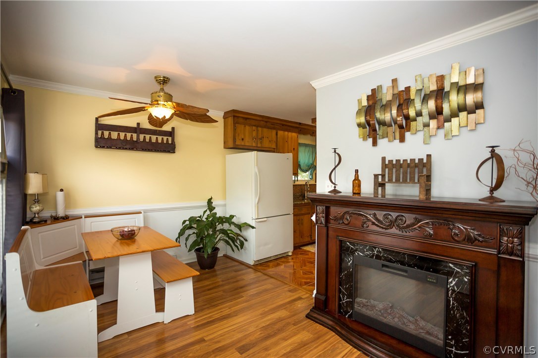 12406 Duck River Road Midlothian, VA 23112 - Photo 3 of 29 a living room with furniture and a fireplace