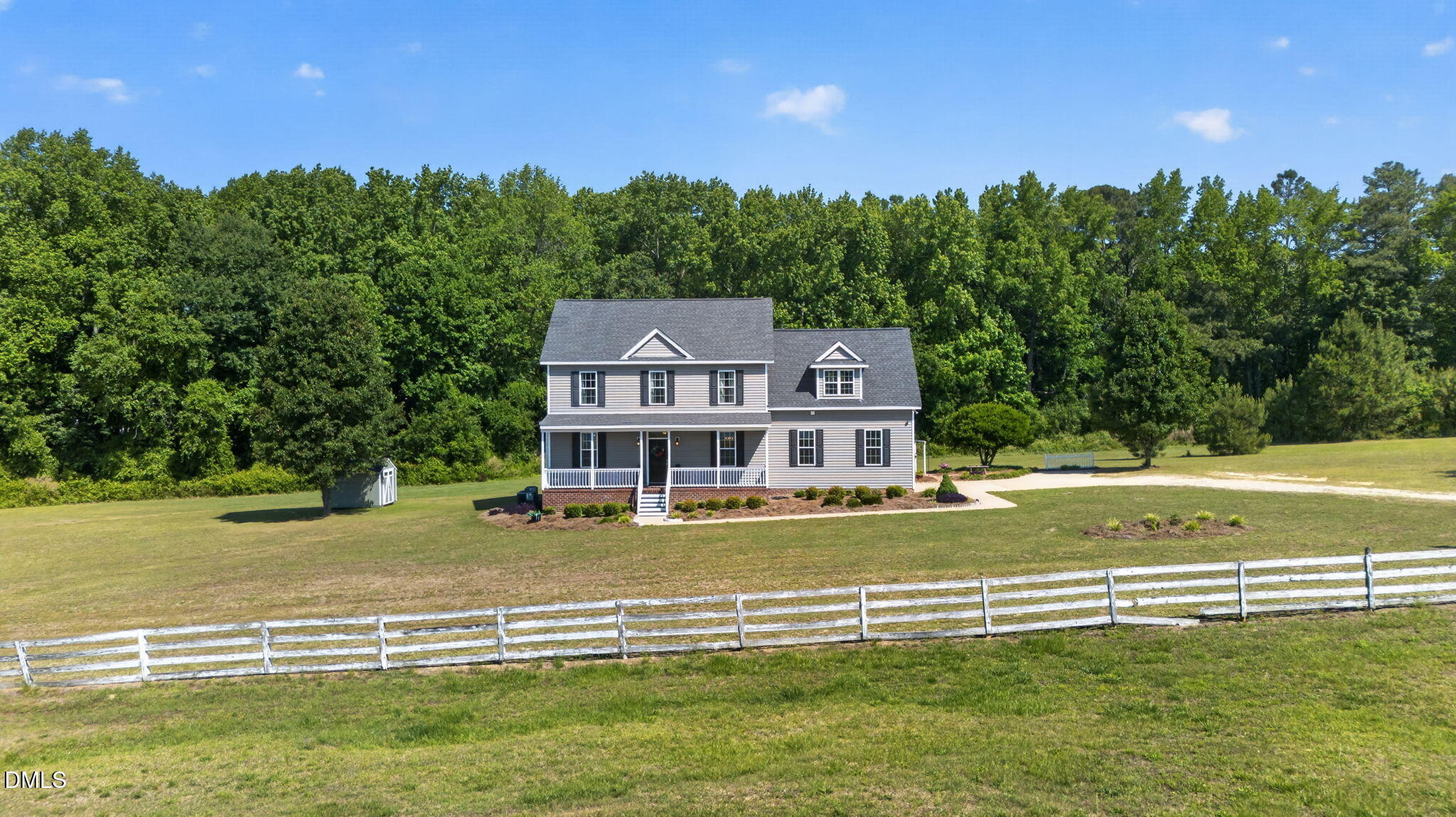 923 White Memorial Church Road Willow Spring, NC 27592 - Photo 41 of 46 a view of a house with a big yard
