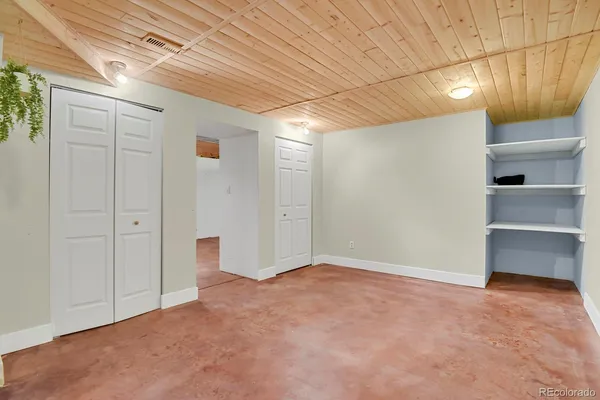 an empty room with closet