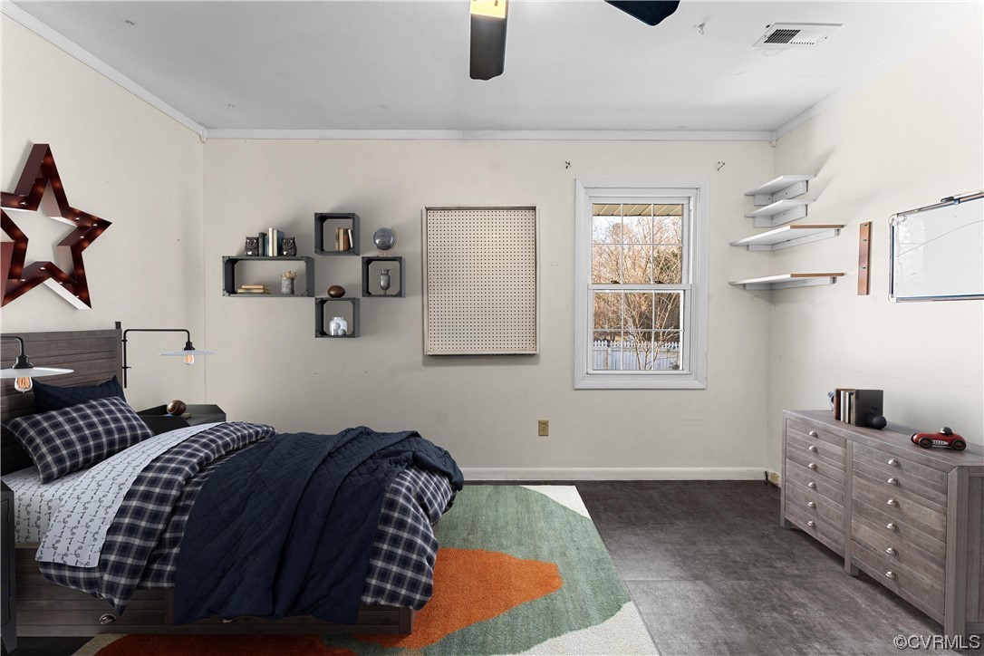 10083 Burkes Pond Road North, VA 23128 - Photo 22 of 36 a bedroom with a bed and window