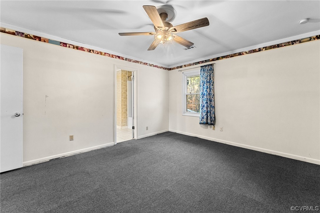 10083 Burkes Pond Road North, VA 23128 - Photo 24 of 36 a view of an empty room