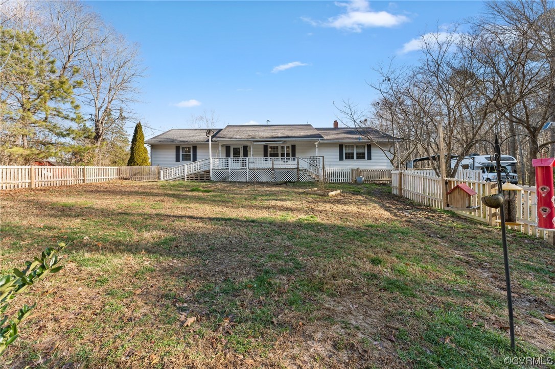 10083 Burkes Pond Road North, VA 23128 - Photo 35 of 36 a front view of a house with a yard