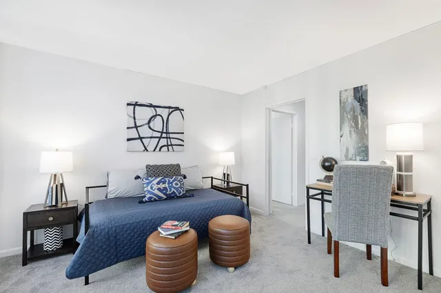 a bedroom with a bed and closet