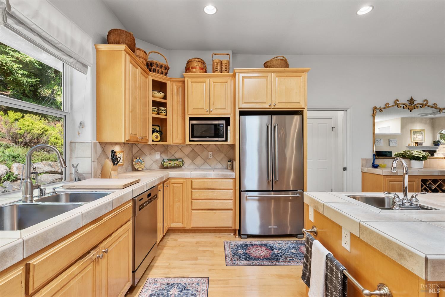 1885 Los Olivos Road Santa Rosa, CA 95404 - Photo 13 of 47 a kitchen with stainless steel appliances granite countertop a refrigerator and a sink