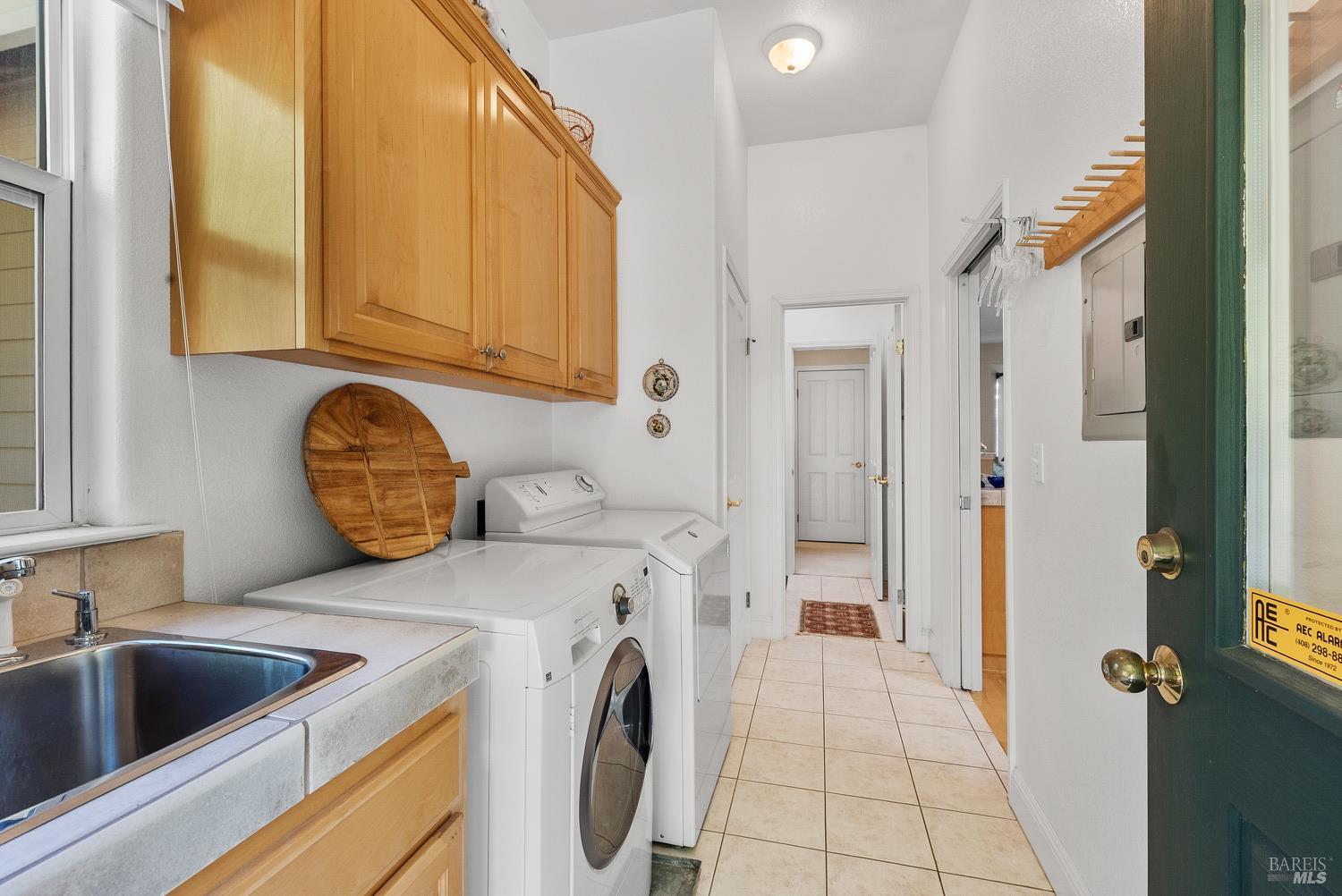 1885 Los Olivos Road Santa Rosa, CA 95404 - Photo 20 of 47 a view of utility room and washer and dryer