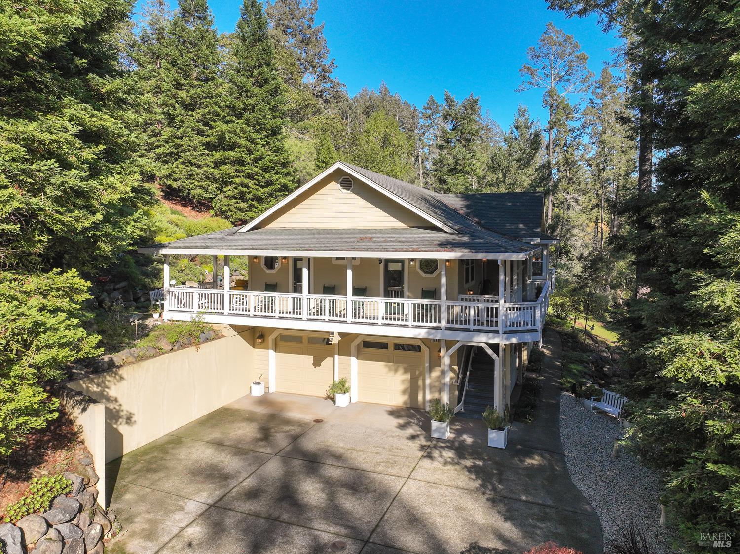 1885 Los Olivos Road Santa Rosa, CA 95404 - Photo 2 of 47 a house with swimming pool in front of it