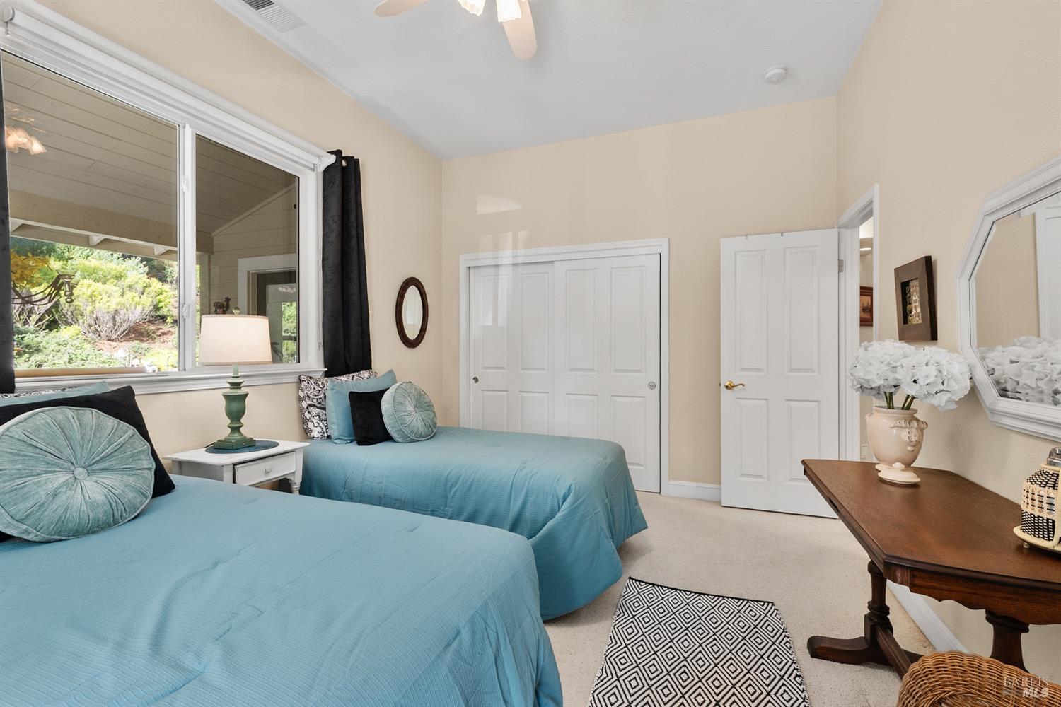 1885 Los Olivos Road Santa Rosa, CA 95404 - Photo 26 of 47 a bedroom with furniture and a large window