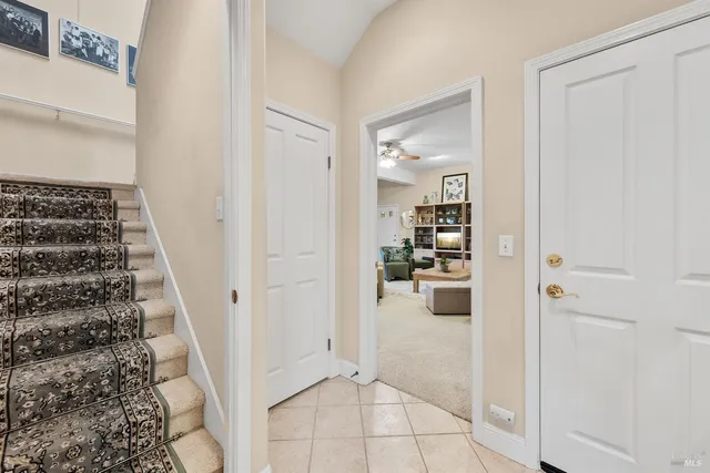 a view of a hallway view with staircase