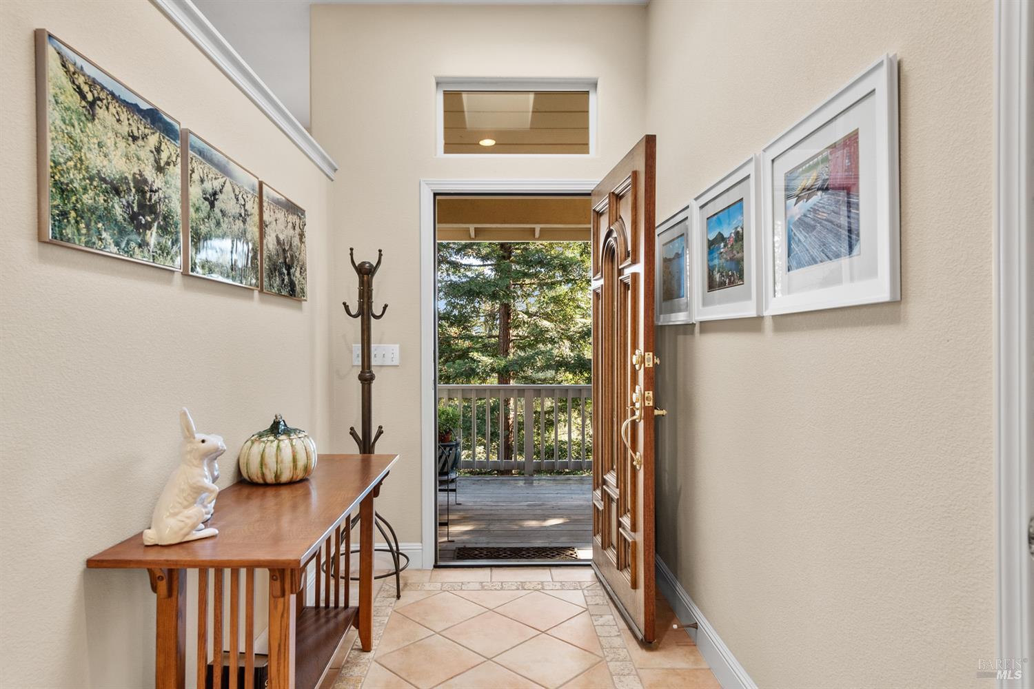 1885 Los Olivos Road Santa Rosa, CA 95404 - Photo 4 of 47 a view of a hallway with windows and stairs