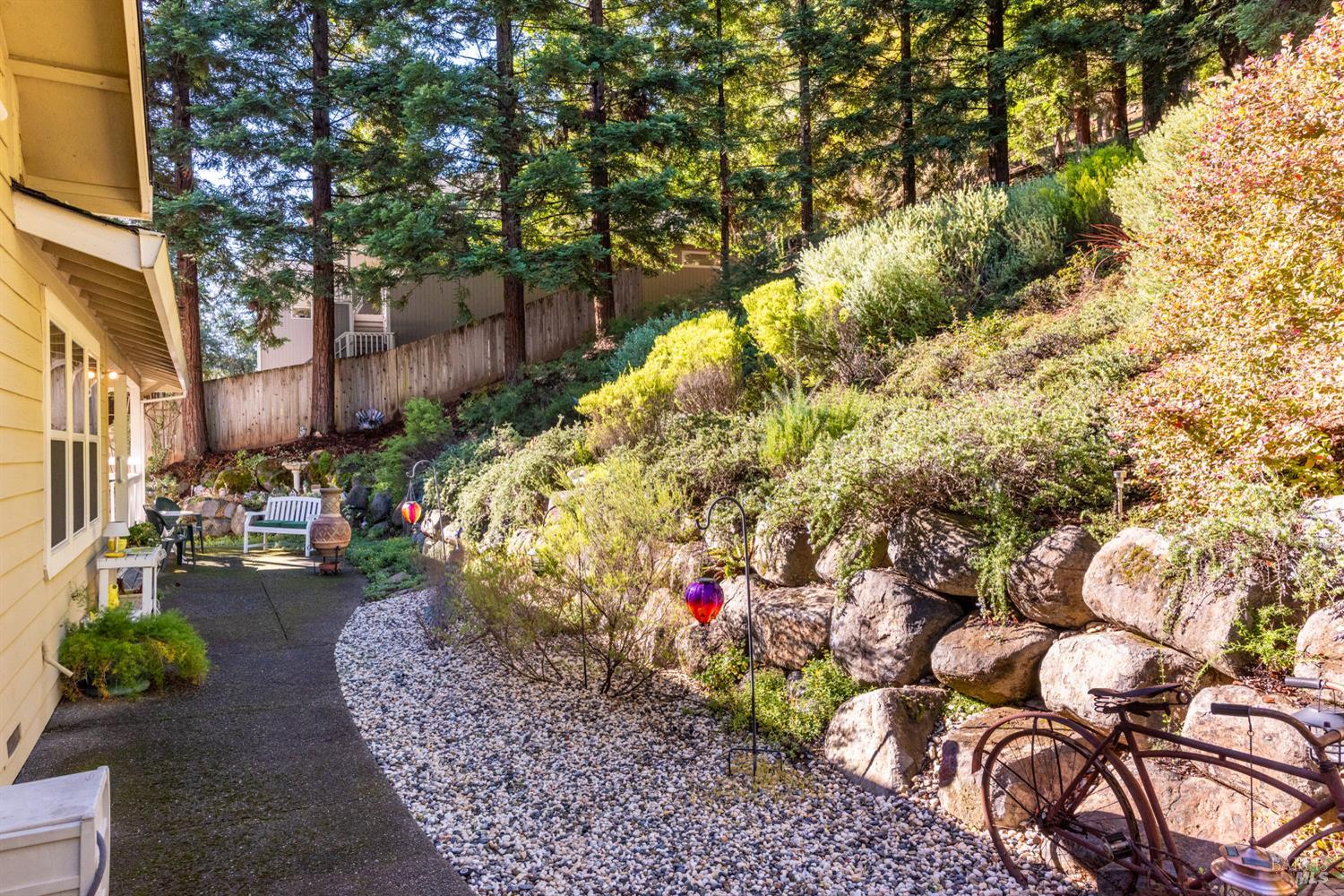 1885 Los Olivos Road Santa Rosa, CA 95404 - Photo 44 of 47 a backyard of a house with lots of green space