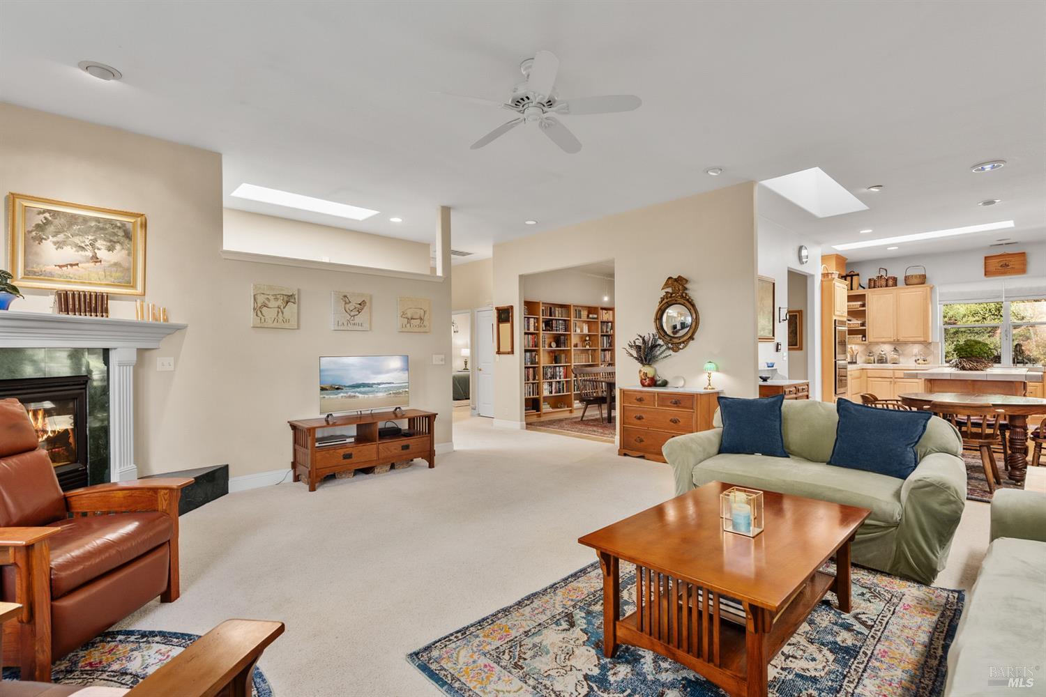 1885 Los Olivos Road Santa Rosa, CA 95404 - Photo 7 of 47 a living room with furniture and a fireplace