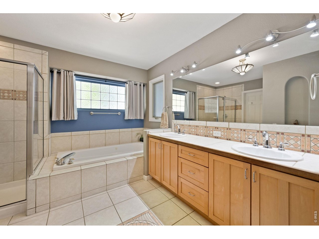 527 Valley View Road Loveland, CO 80537 - Photo 23 of 46 Beautiful Primary 5-Piece Ensuite Bath--Separate Soaking Tub & Shower