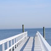 a view of balcony with furniture