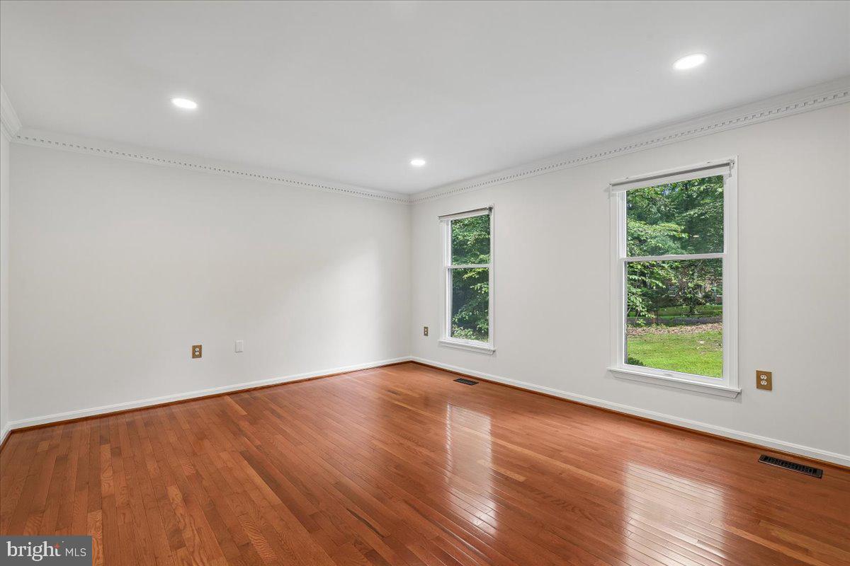 8253 Honeysuckle Road Manassas, VA 20112 - Photo 14 of 112 Bright Living room with lovely hardwood floors.