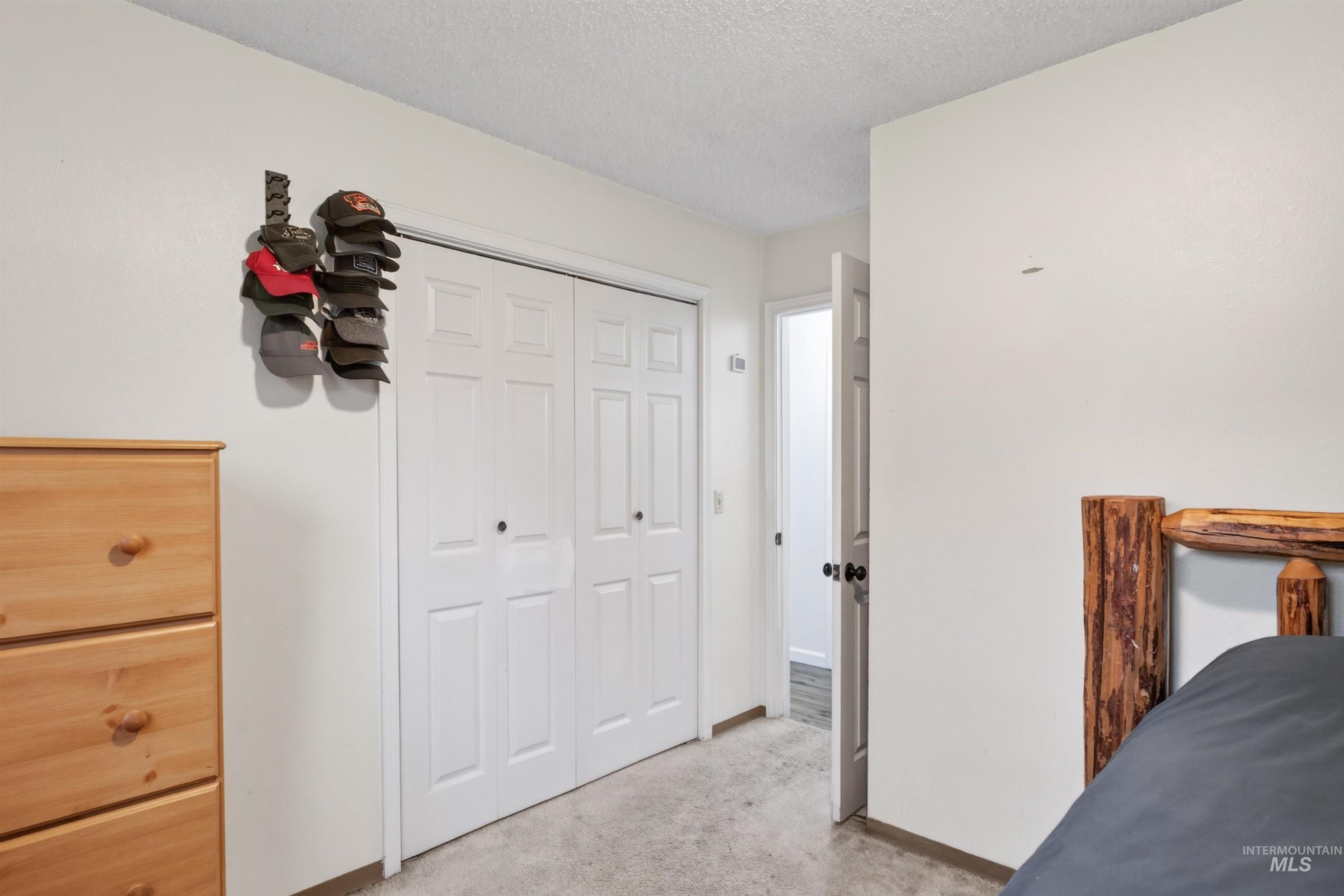 247 North Beech Street Genesee, ID 83832 - Photo 14 of 27 Bi-fold closet doors with black hardware