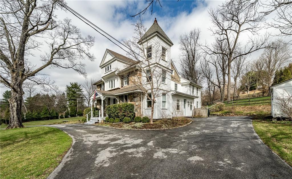 701 Oakbourne Road West Chester, PA 19382 - Photo 41 of 50 a view of a building with a yard