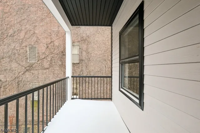 front view of a house with a small yard