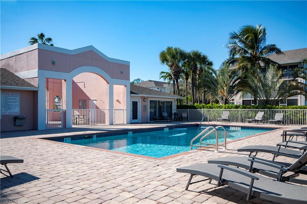 3281 Lindsey Lane, Unit 55 Naples, FL 34109 - Photo 38 of 43 a view of a house with swimming pool