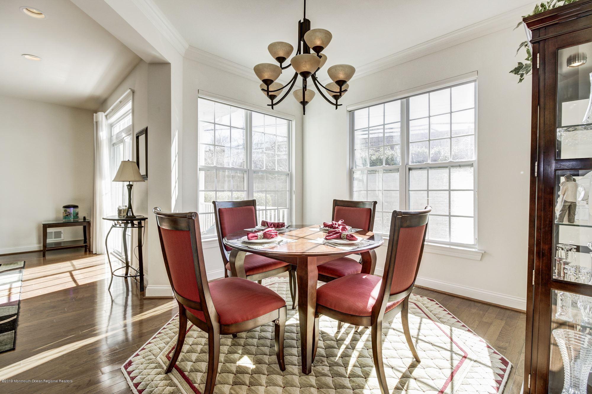 1006 Abby Road Middletown, NJ 07748 - Photo 14 of 44 a view of a dining room with furniture window and outside view