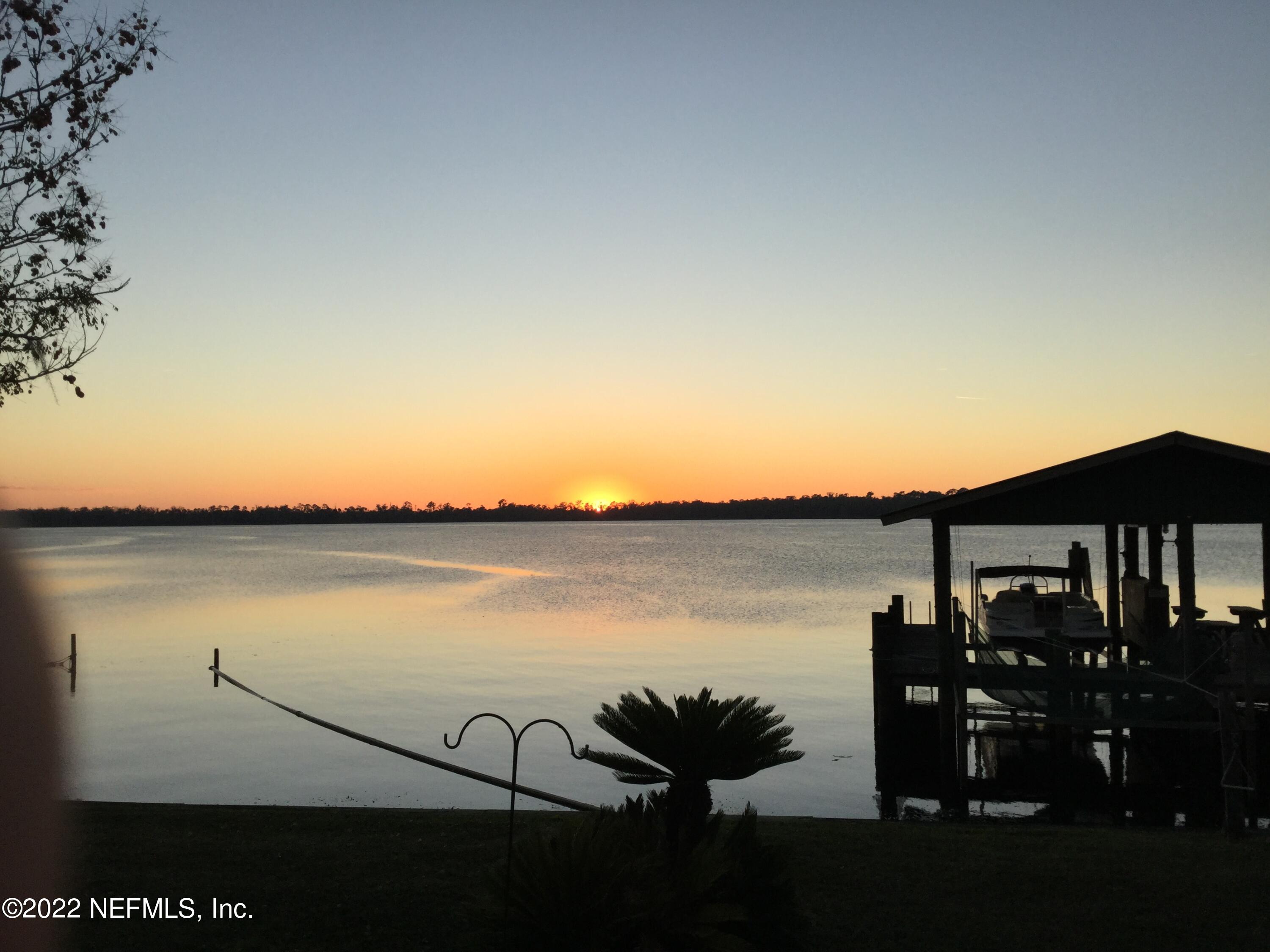 121 Jimmie Road Crescent City, FL 32112 - Photo 12 of 45 a view of a lake with outside seating space