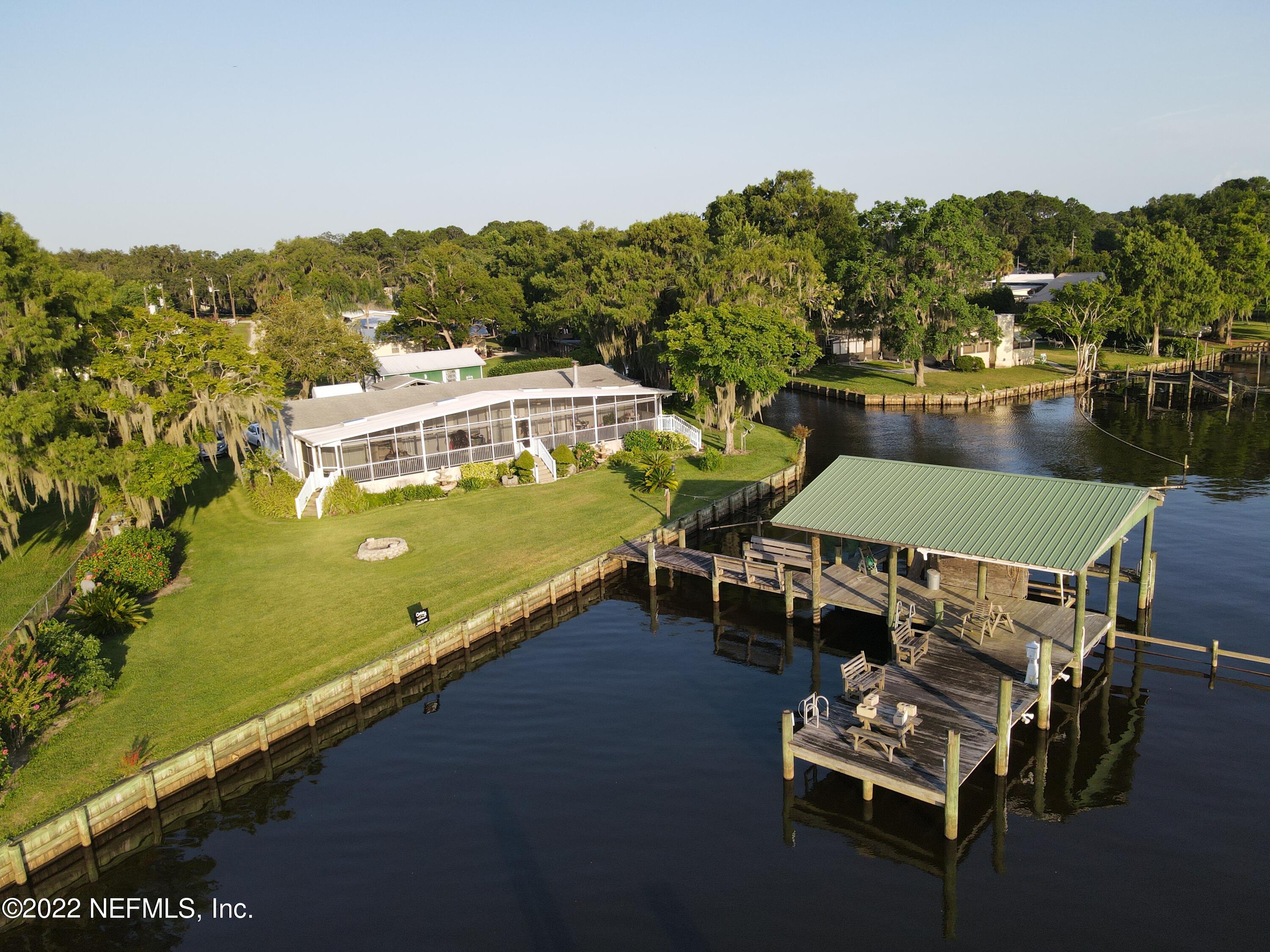121 Jimmie Road Crescent City, FL 32112 - Photo 2 of 45 a view of a balcony with chairs