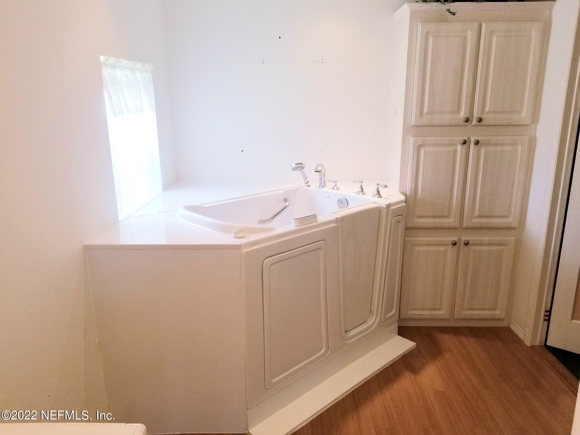 121 Jimmie Road Crescent City, FL 32112 - Photo 24 of 45 a bathroom with a sink and a mirror
