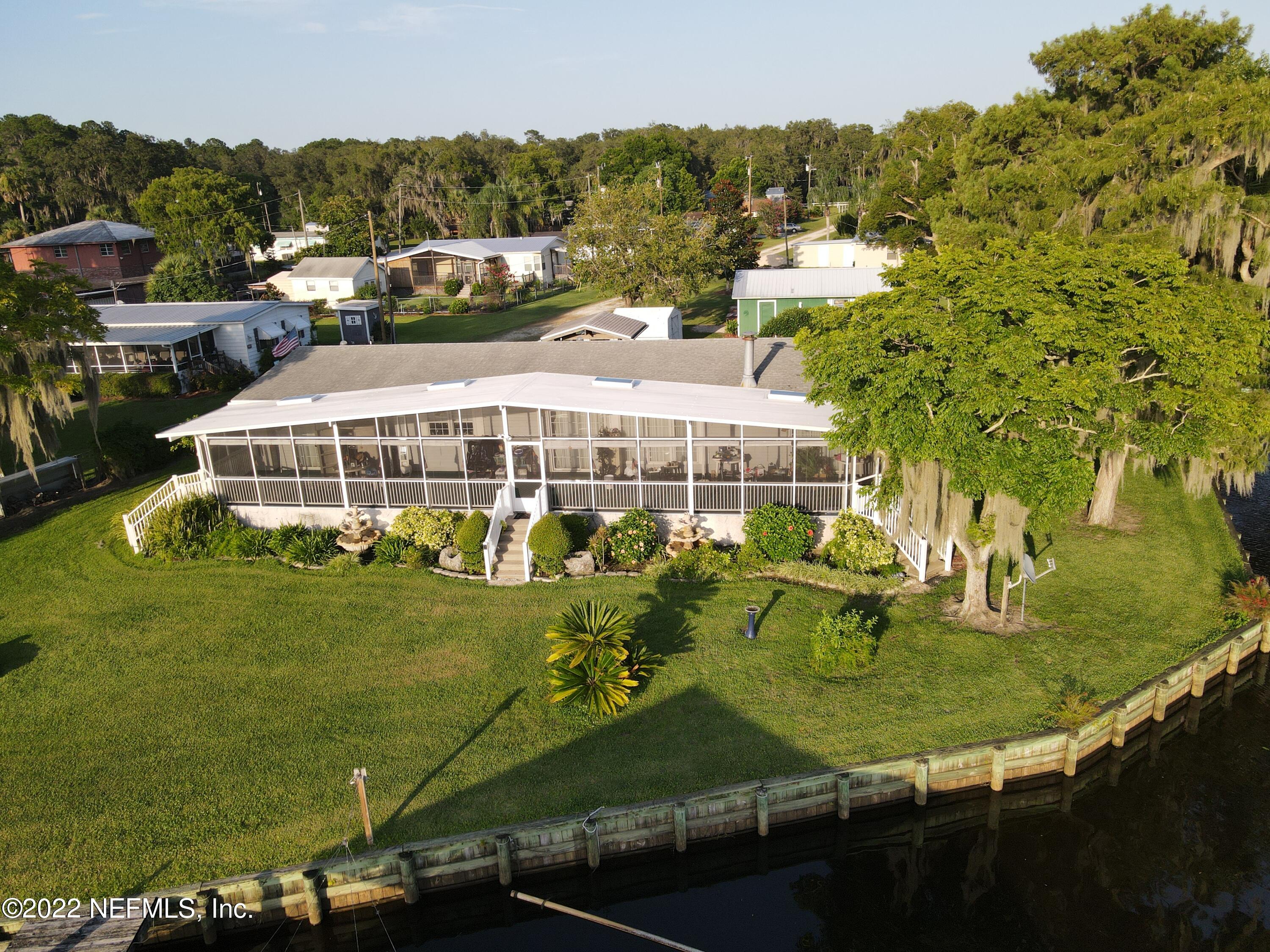 121 Jimmie Road Crescent City, FL 32112 - Photo 3 of 45 a view of a swimming pool with a garden