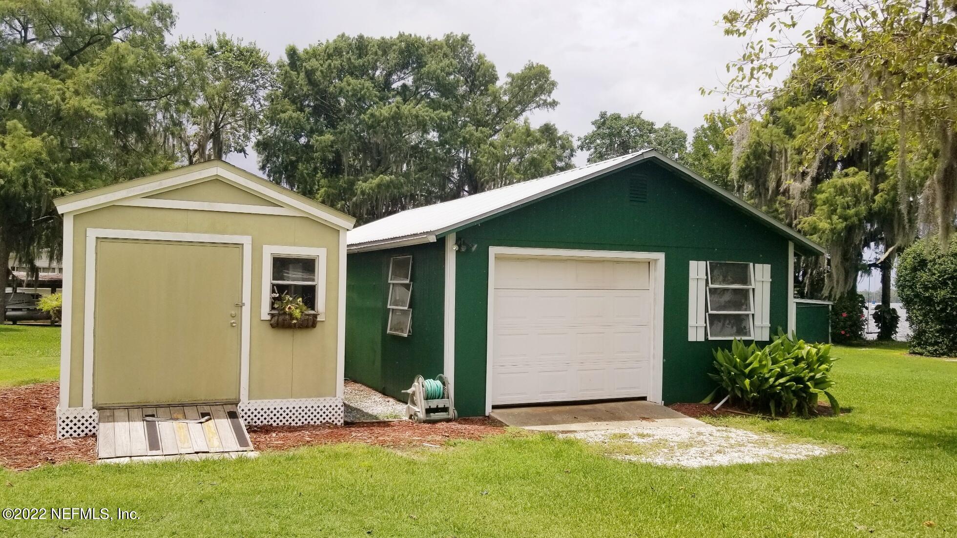 121 Jimmie Road Crescent City, FL 32112 - Photo 31 of 45 a front view of a house with a yard