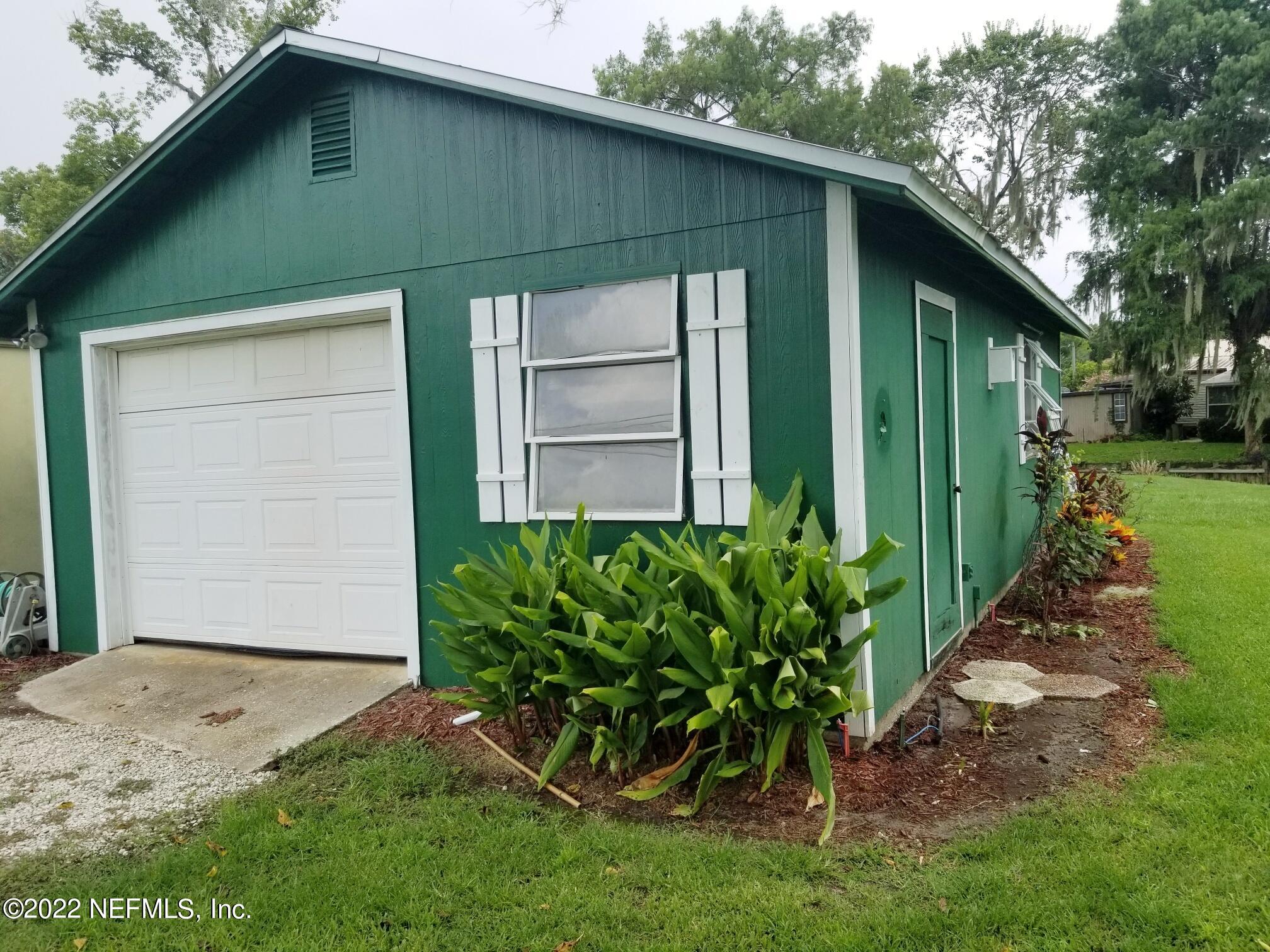 121 Jimmie Road Crescent City, FL 32112 - Photo 32 of 45 a front view of a house with garden