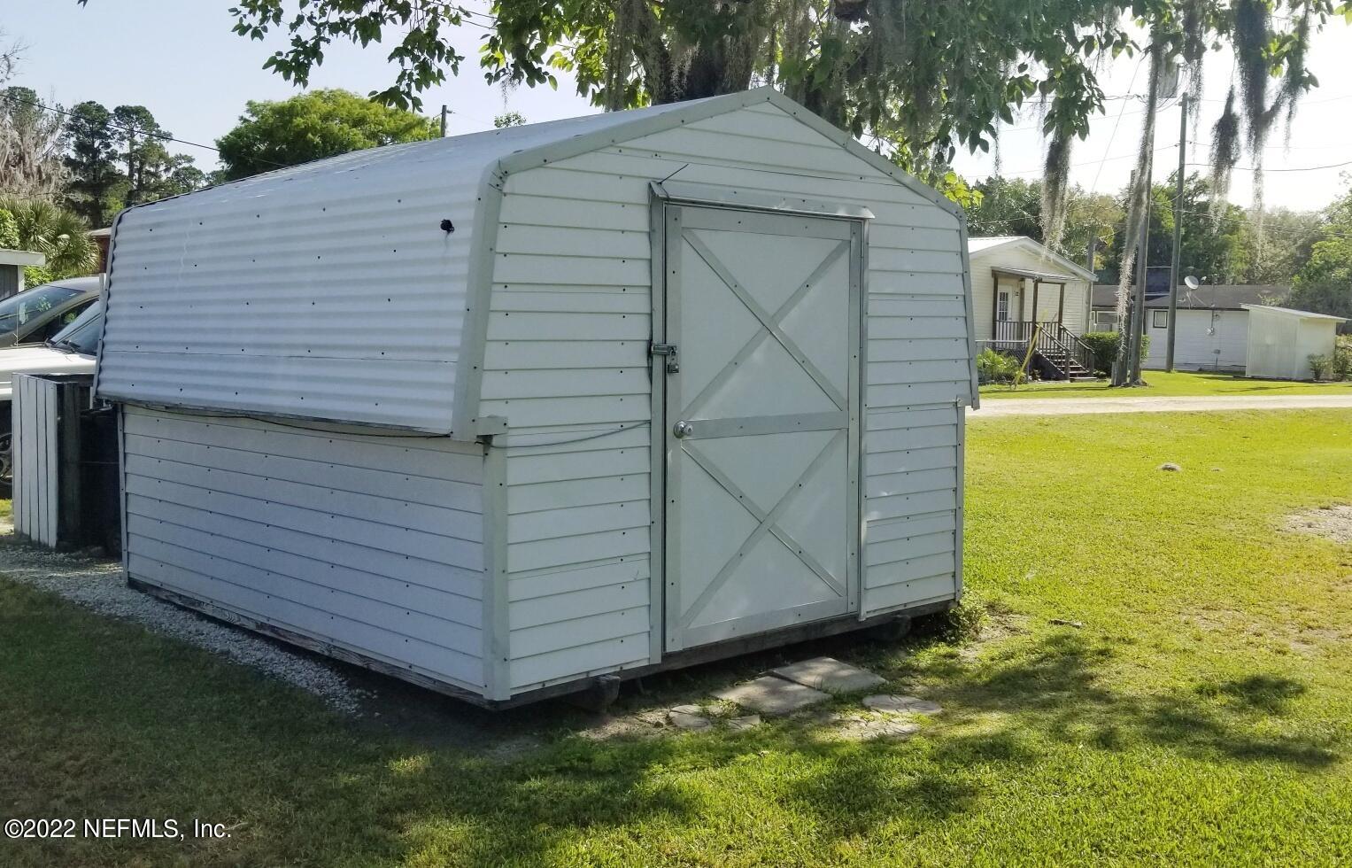 121 Jimmie Road Crescent City, FL 32112 - Photo 33 of 45 a view of a small house with backyard