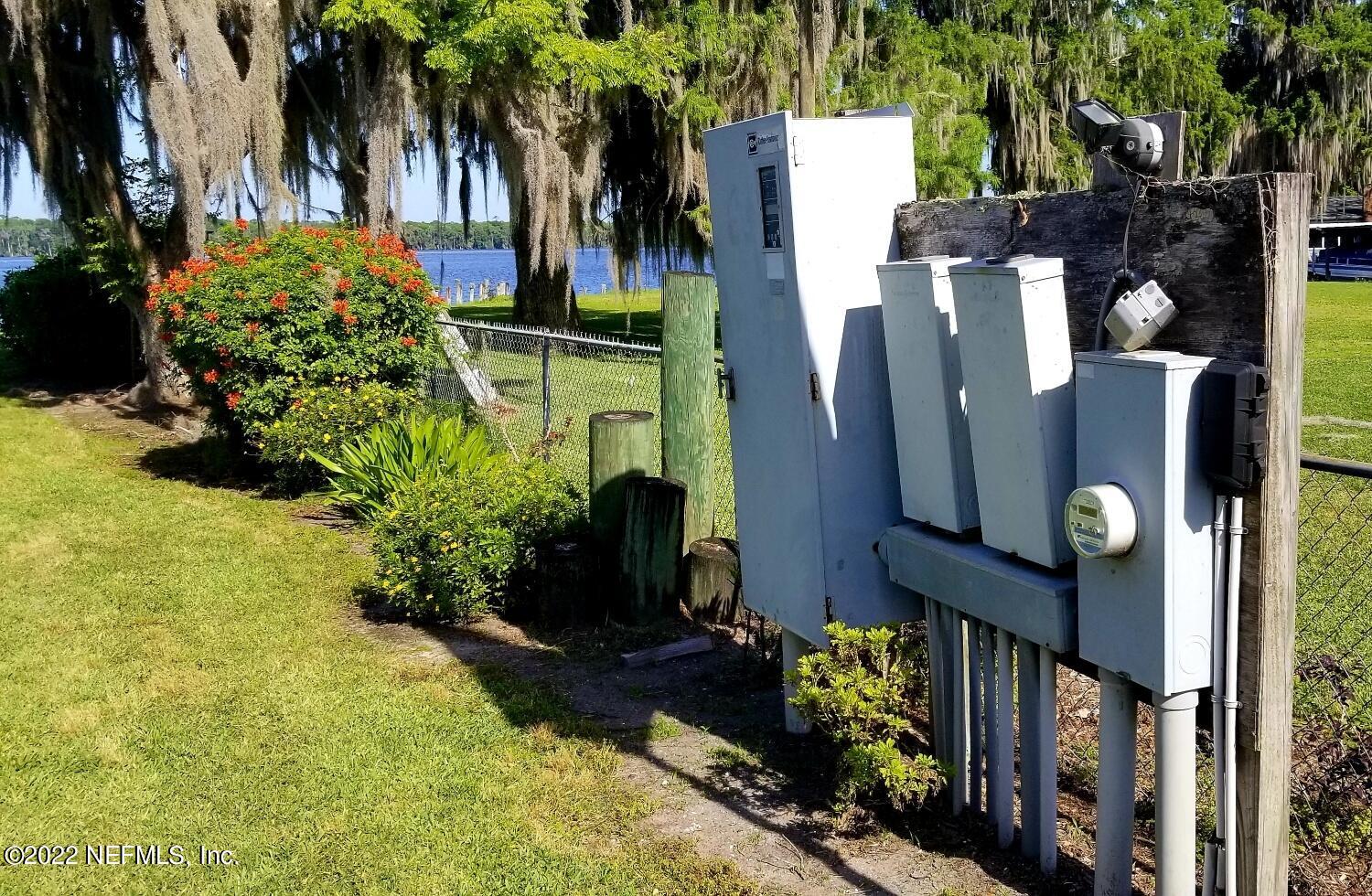 121 Jimmie Road Crescent City, FL 32112 - Photo 35 of 45 a backyard of a house with outdoor seating