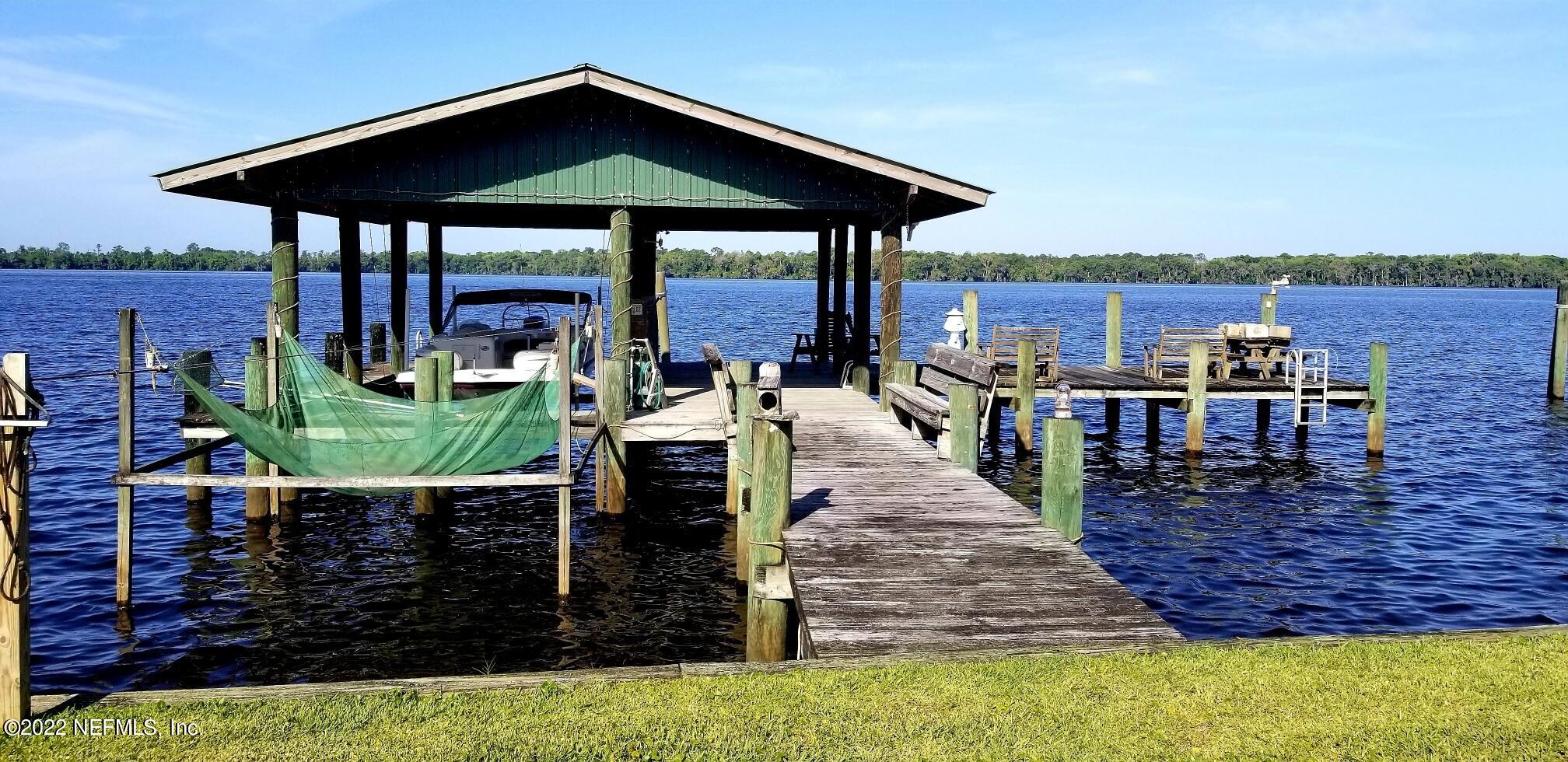 121 Jimmie Road Crescent City, FL 32112 - Photo 8 of 45 a view of a chairs and table in the patio