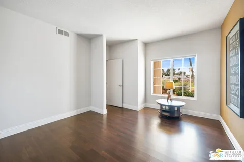 a view of livingroom with hardwood floor and window