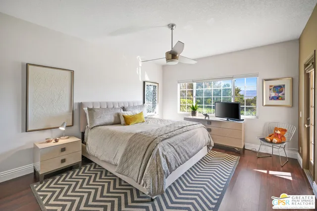 a bed room with a bed and a couch