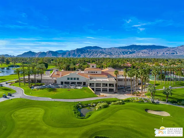 a view of a city with lawn chairs