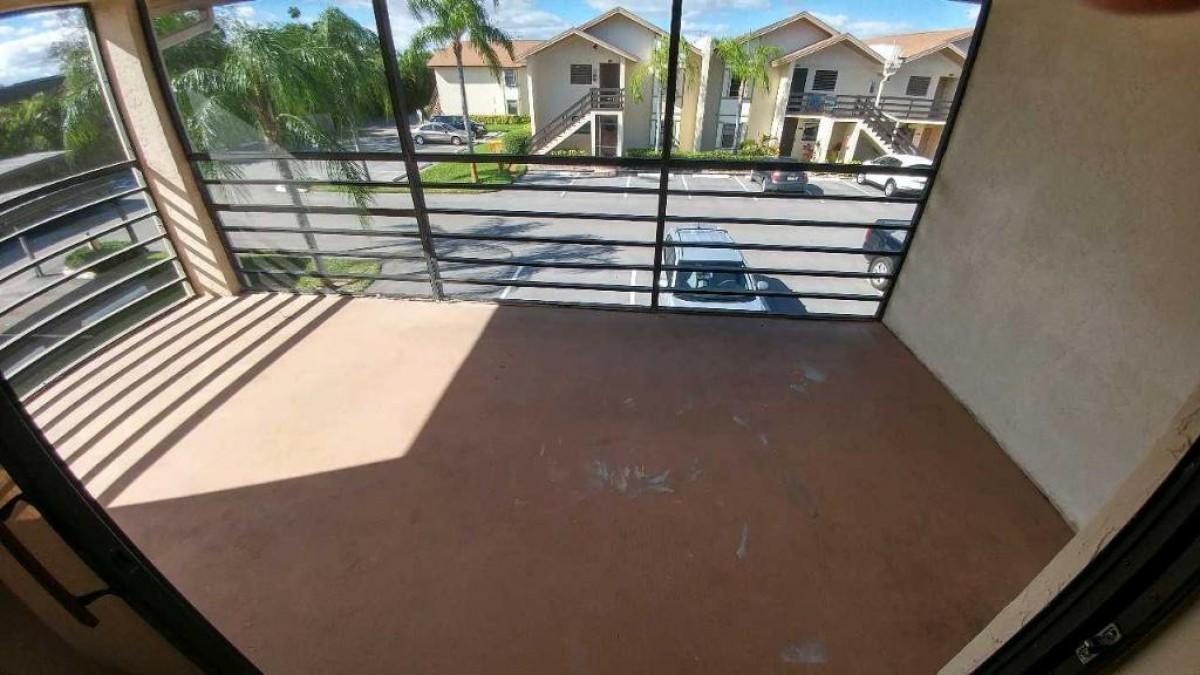1841 Southwest Palm City Road, Unit D102 Stuart, FL 34994 - Photo 14 of 17 a view of outdoor space and deck