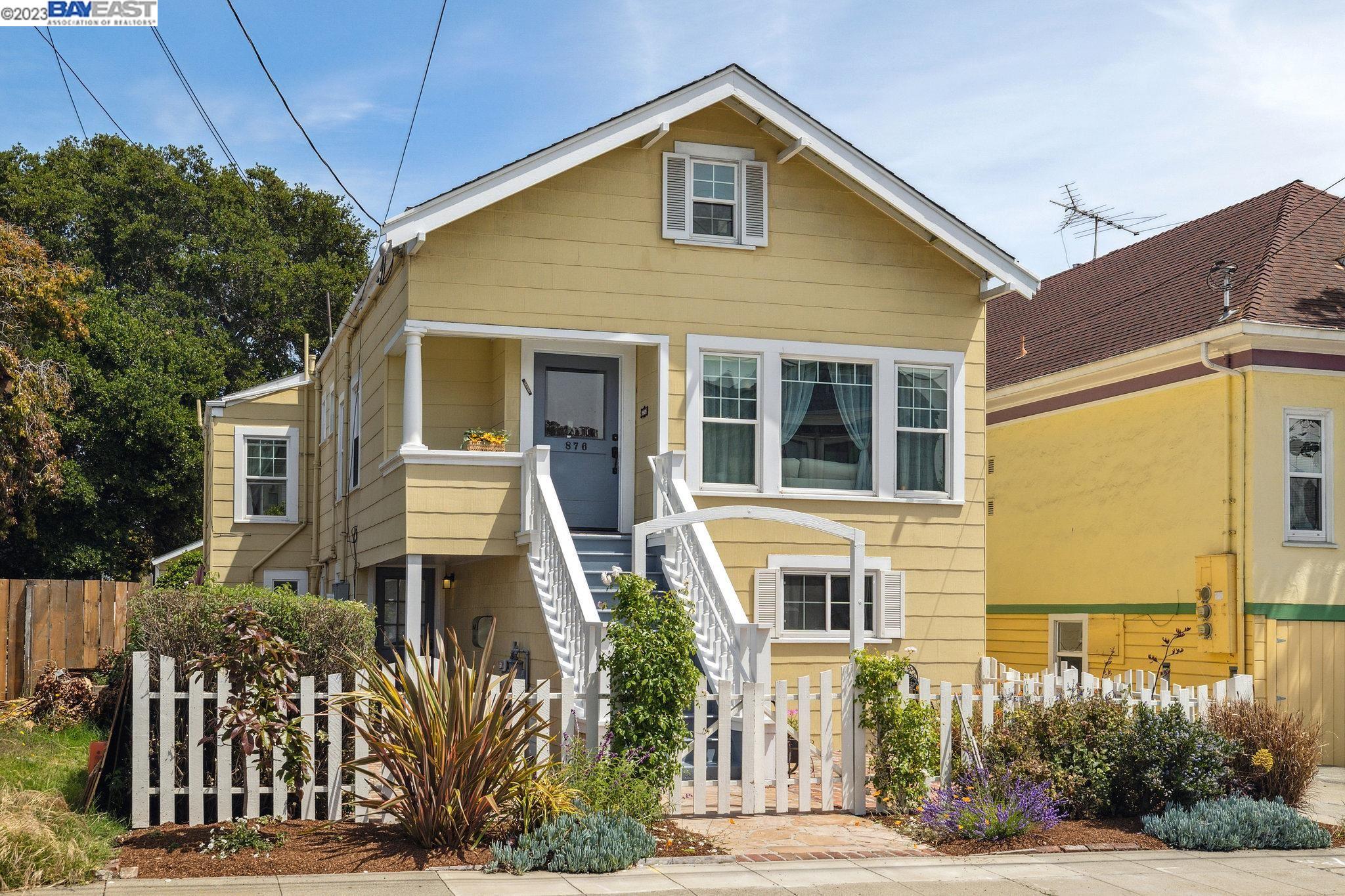 876 Walnut Street Alameda, CA 94501 - Photo 1 of 1 a front view of a house with a yard
