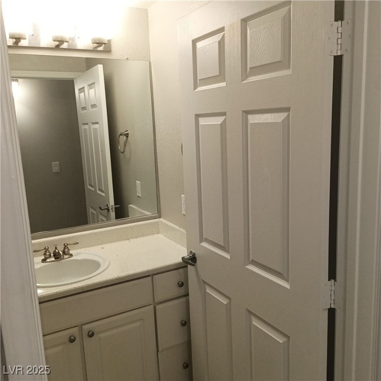 9000 South Las Vegas Boulevard, Unit 1239 Las Vegas, NV 89123 - Photo 10 of 10 Half bathroom with vanity