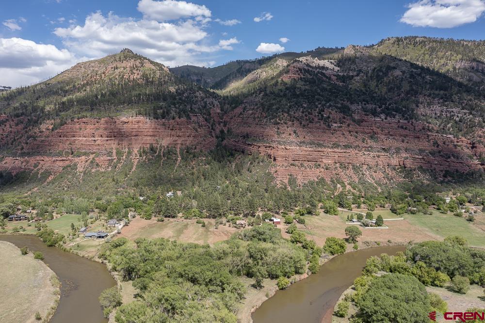 3705 County Road 250 Durango, CO 81301 - Photo 31 of 34 a view of a lake with mountains in front of it