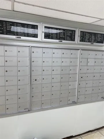 a swimming pool with outdoor seating and yard