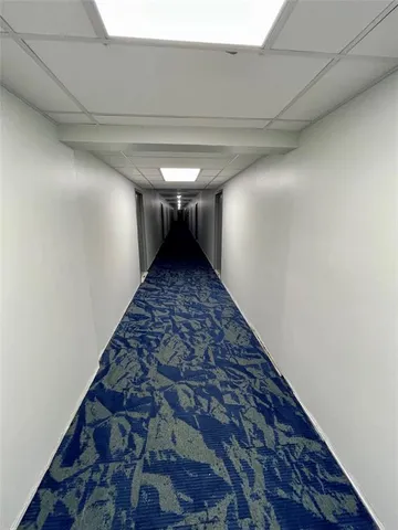 a view of a hallway with entryway