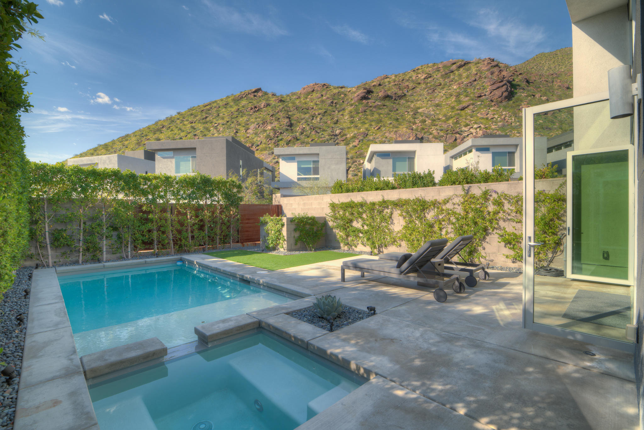 305 Goleta Way Palm Springs, CA 92264 - Photo 2 of 34 a view of a house with backyard porch and sitting area